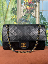 Chanel medium double flap lambskin black 24k gold-plated