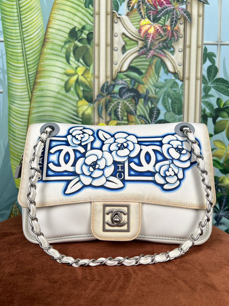 Chanel sports white camelia nylon flap bag