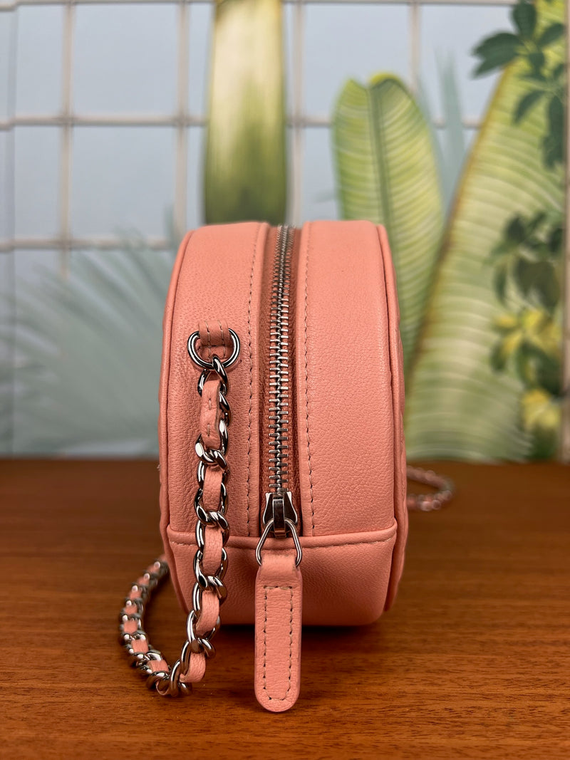 Chanel round camellia bag embossed light pink
