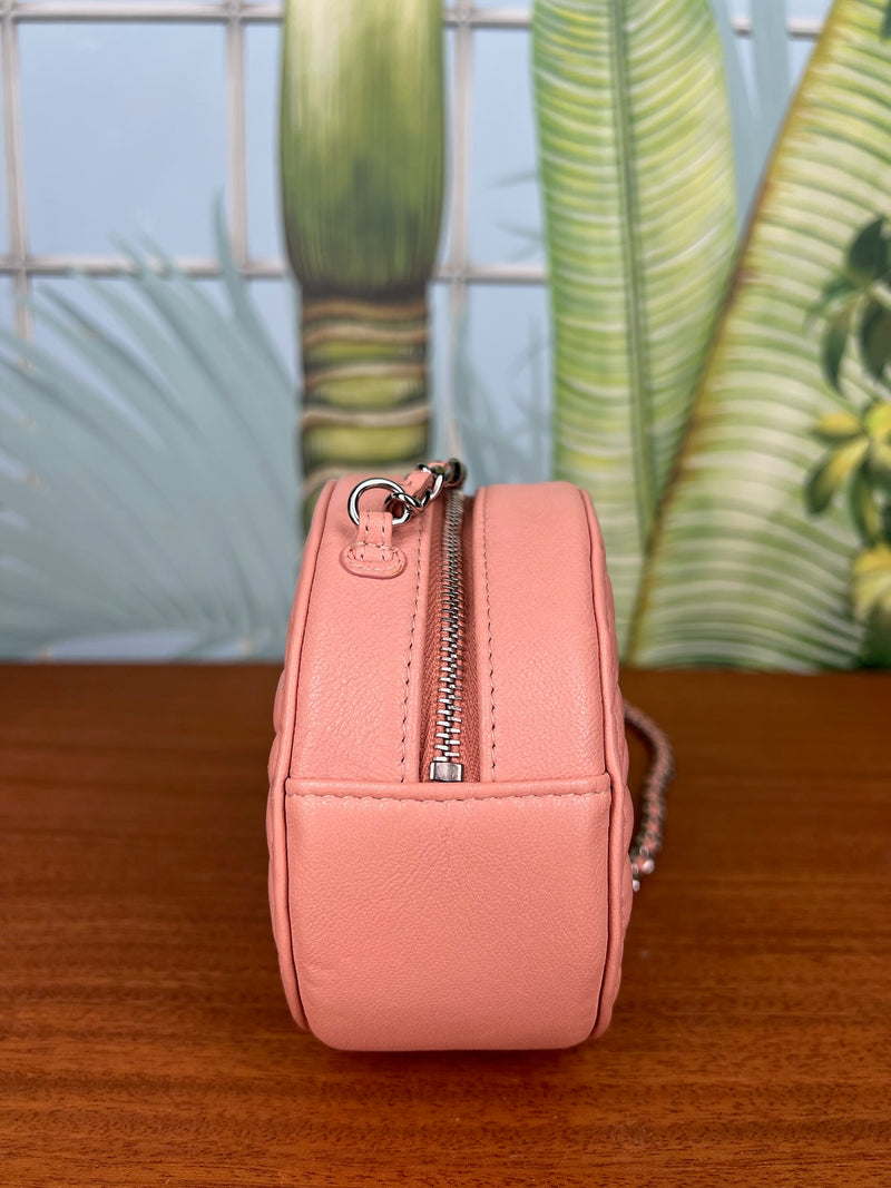 Chanel round camellia bag embossed light pink