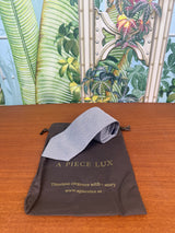 Louis Vuitton tie grey with pink blue logo
