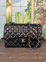 Chanel double flap bag jumbo black lambskin, silver hardware
