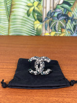 Chanel brooch in silver with pearls and stones