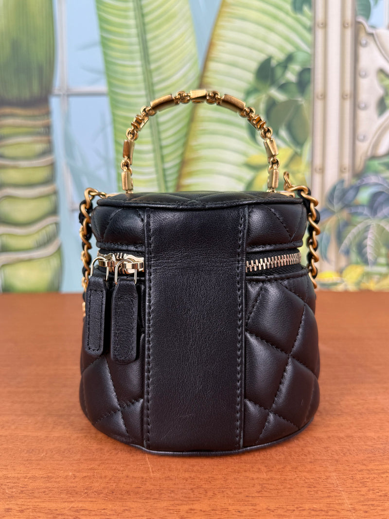 Chanel black mini vanity bag round with chain