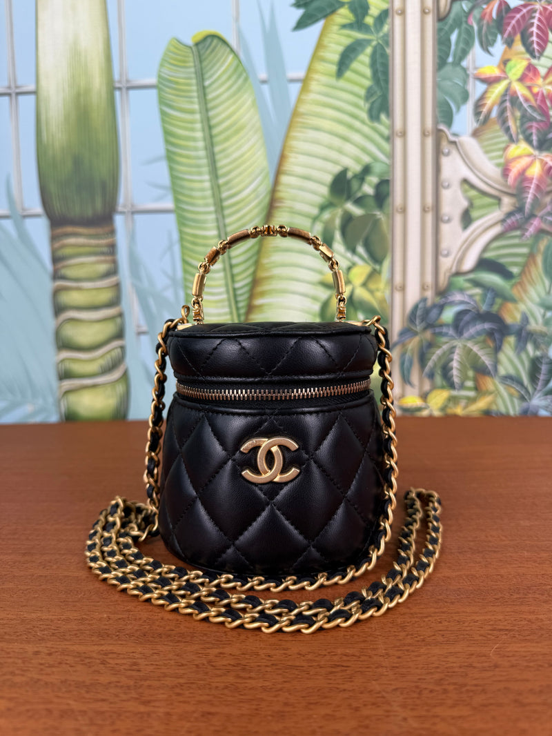 Chanel black mini vanity bag round with chain