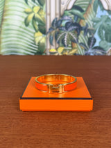 Hermès Clic H Bracelet orange/gold