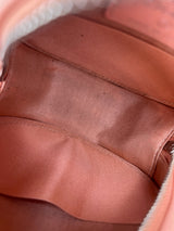 Chanel round camellia bag embossed light pink