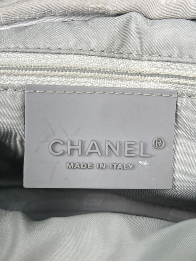 Chanel sports white camelia nylon flap bag