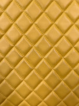 Chanel timeless yellow quilted cutch