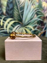 Alexander McQueen bracelet gold
