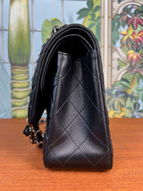 Chanel double flap bag jumbo black lambskin, silver hardware