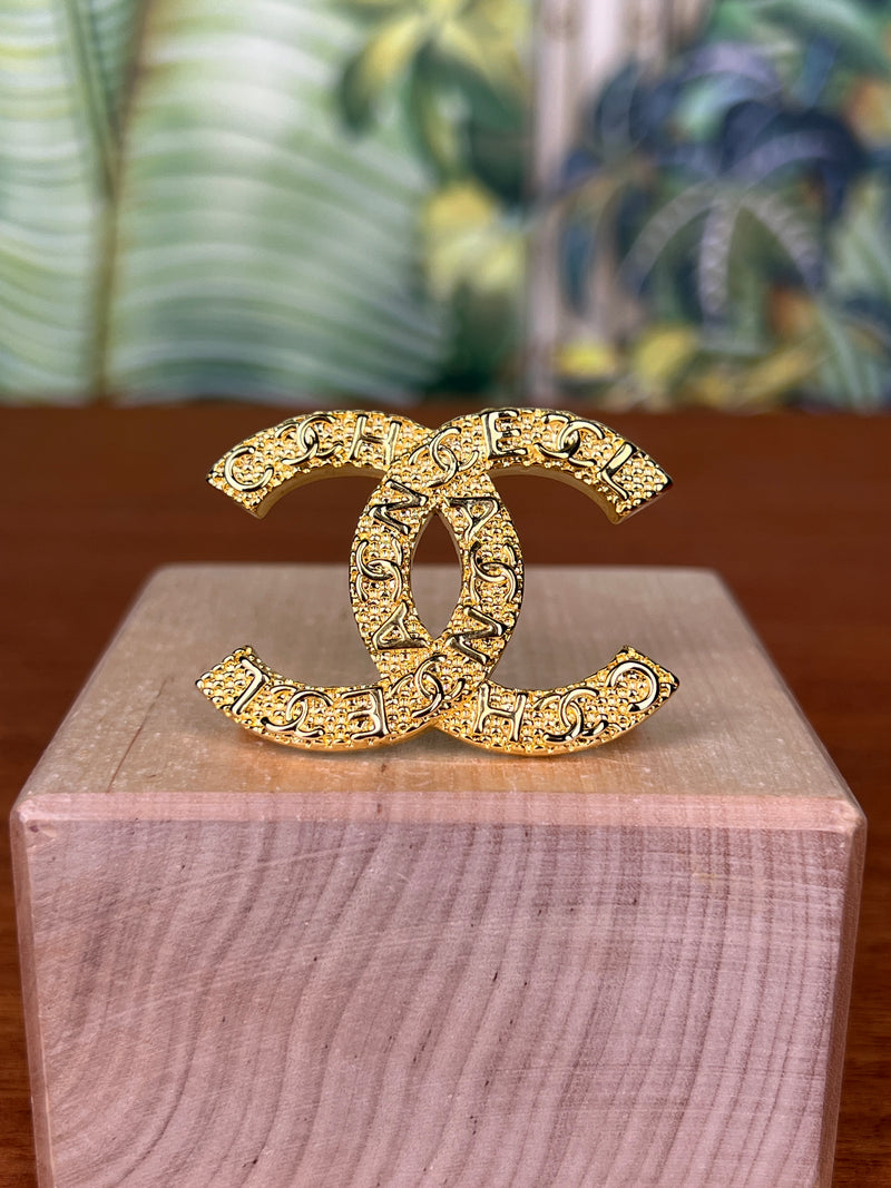 Chanel brooch gold