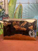 Louis Vuitton gold mirror inventeur wristlet pochette