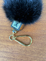Louis Vuitton key ring fur ball black