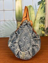 Louis Vuitton monogram denim pleaty bag