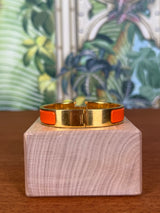 Hermès Clic H Bracelet orange/gold