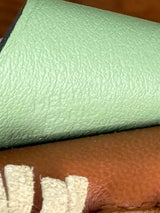 Hermès rodeo charm PM gold/ craie/ vert criquet