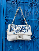 Chanel sports white camelia nylon flap bag