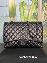 Chanel jumbo flap bag black lambskin, silver hardware