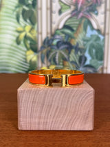 Hermès Clic H Bracelet orange/gold