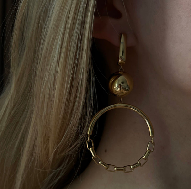 Sägen Solar Golden Statement Earrings